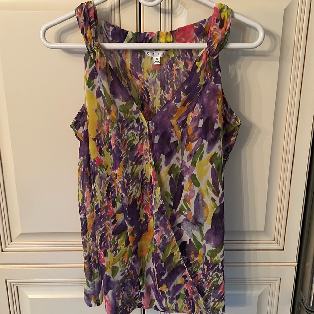 Beautiful sleeveless blouse.